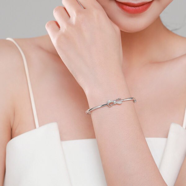 Bowknot Bangle in S925 Sterling Silver – Delicate Sparkle, Sweet Minimalism - Image 4